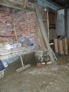 The fireplace after the floor was excavated, early 2009.