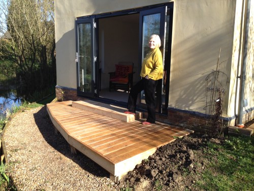 The finished terrace, with step and oak facings